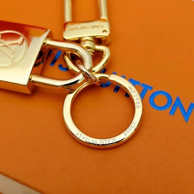 LOUIS VUITTON Lock Keychain [2 styles]